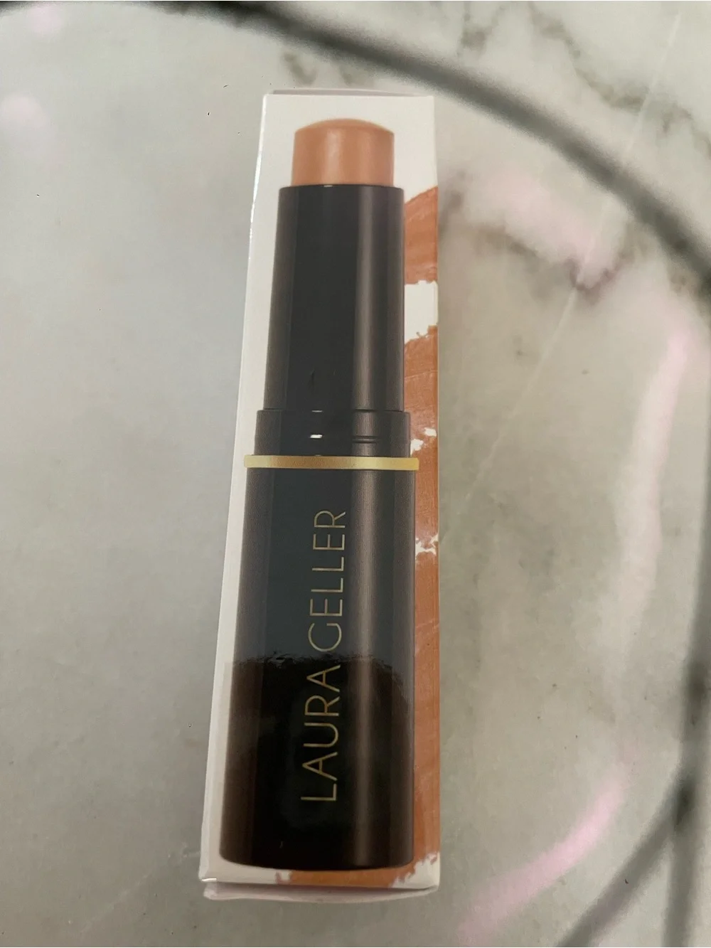 New Laura Geller instant enhancer, buildable foundation stick, medium